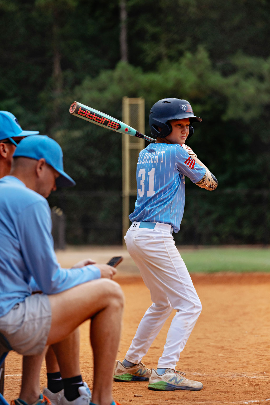 Calvin Albright in the Revolution’s blue pinstripe uniform at Cherry Park.