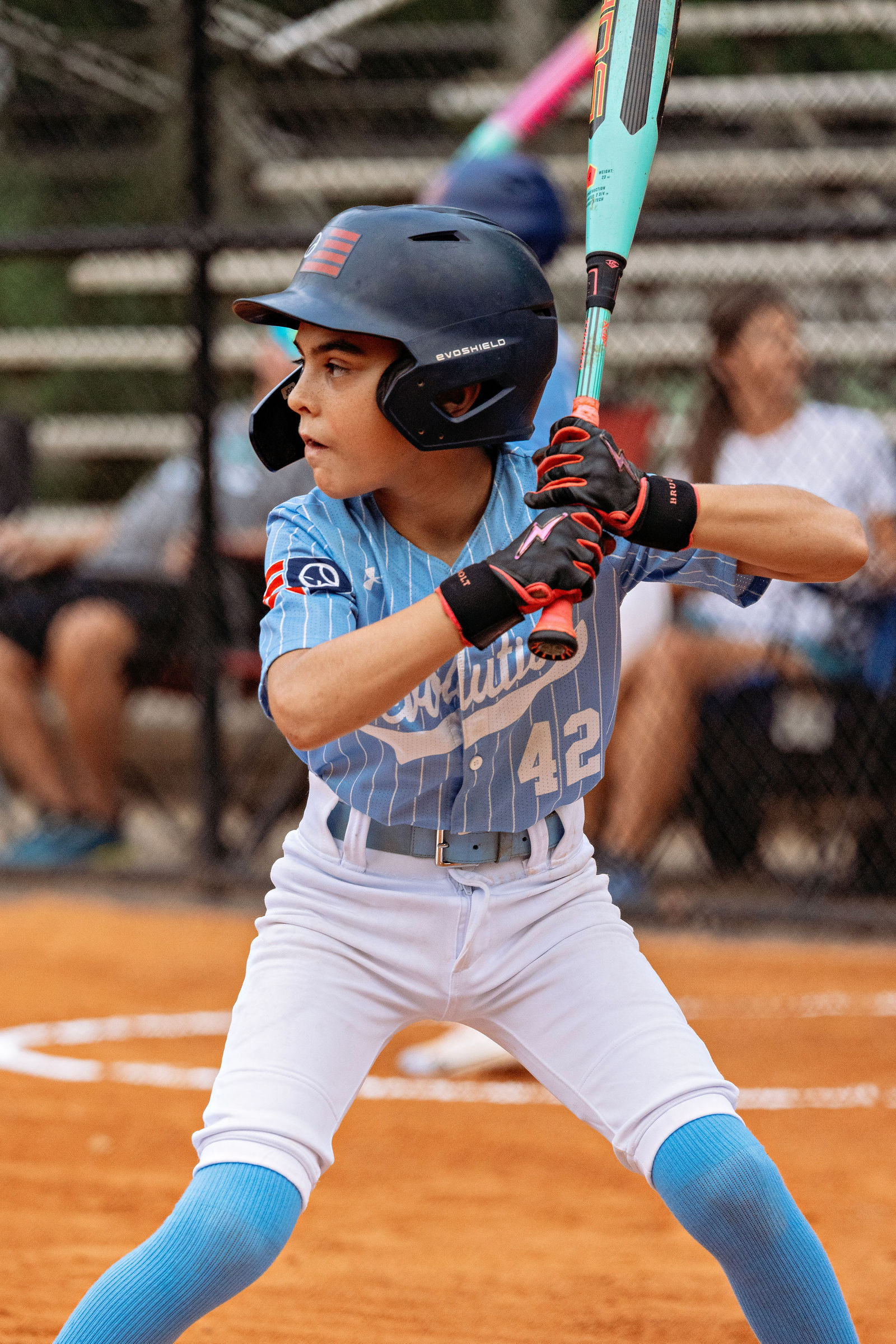 Edwin Eddie Brietz at bat in his blue pinstripe Revolution uniform.